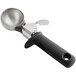 An OXO metal and black plastic thumb press ice cream scoop with a handle.