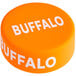 An orange round silicone lid with a white buffalo logo.