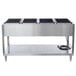 A Vollrath stainless steel electric hot food table with four sealed pans.