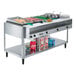 A Vollrath ServeWell electric hot food table with food in a large metal pan.