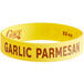 A yellow silicone wristband with red text reading "Garlic Parmesan" on it.