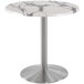 A Holland Bar Stool white marble round table top with stainless steel round base.