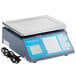 A grey AvaWeigh thermal label printing scale on a butcher shop counter.