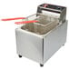 A Cecilware stainless steel electric countertop deep fryer with a basket.