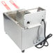 A Cecilware stainless steel commercial electric countertop deep fryer with a wire basket and two red handles.