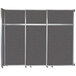 A Versare charcoal gray sliding room divider with silver trim.