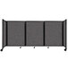 A Versare charcoal gray foldable room divider with wheels.