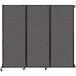 A Versare charcoal gray wall-mounted folding room divider with three panels.