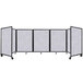 A Versare Marble Gray SoundSorb room divider with four panels.