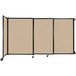 A Versare beige wall-mounted sliding room divider with tan fabric panels.