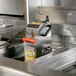A VITO fryer oil filter machine on a counter.