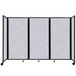 A Versare Marble Gray SoundSorb folding room divider with four panels.