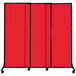 A red Versare Quick-Wall portable room divider with black wheels.