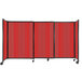 A red Versare Poly StraightWall sliding room divider with wheels.