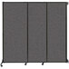 A Versare charcoal gray wall-mounted sliding room divider with three panels.