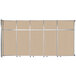 A beige wall mounted room divider with tan fabric panels.