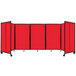 A red polycarbonate Versare room divider with black wheels.