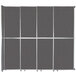 A Versare charcoal gray paneled room divider.