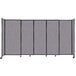 A Versare Cloud Gray StraightWall sliding room divider with black metal frame.