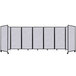 A marble gray Versare SoundSorb folding room divider with black trim.
