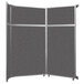A Versare charcoal gray room divider with metal frame and doors.