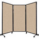 A Versare beige room divider with a black frame and tan fabric.
