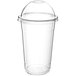 A clear plastic Choice 20 oz. plastic cup with a dome lid.