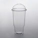 A Choice clear plastic cup with a dome lid.