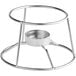 A Valor stainless steel fondue pot stand on a table.