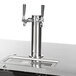A black Beverage-Air wine kegerator with a silver metal tap with three taps.