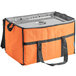 An orange and black Choice large insulated cooler bag on a counter.