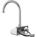 A Waterloo chrome hands-free sensor faucet with a gooseneck spout and cable attached to it.