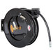 A black Equip by T&amp;S hose reel with a black hose attached.