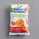 A bag of Goya Hot and Spicy Plantain Chips on a gray surface.