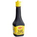 A black Maggi Jugo Seasoning Sauce bottle with a yellow cap.