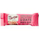 A pink Bob's Red Mill Peanut Butter Jelly & Oats Bar package on a counter.