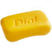 A yellow bar of Dial deodorant soap.