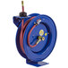 A blue Coxreels hose reel with a low pressure hose attached.