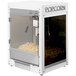 A white Paragon Mod Pop popcorn machine with a glass container of popcorn inside.