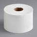 A roll of Lavex Select 2-ply toilet paper on a gray surface.