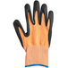 A pair of orange and black Mercer Culinary Millennia Level A4 cut-resistant gloves.