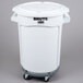A white Rubbermaid BRUTE storage bin with wheels and a lid.