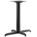 A black metal Lancaster Table & Seating Excalibur table pedestal with a square top.