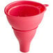A close-up of a pink Fox Run silicone canning funnel with two handles.