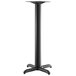 A black metal Lancaster Table & Seating Excalibur bar height table base with a pedestal column.