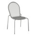 A Lancaster Table & Seating Harbor Gray metal chair with a mesh back.