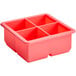 A red silicone square container with four cube compartments.