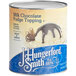A J. Hungerford Smith Milk Chocolate Fudge Topping can over a scoop of ice cream.