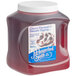 A plastic container of J. Hungerford Smith Cherry Dessert Topping with a white lid.