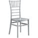 A silver Lancaster Table & Seating resin Chiavari chair with a white seat.